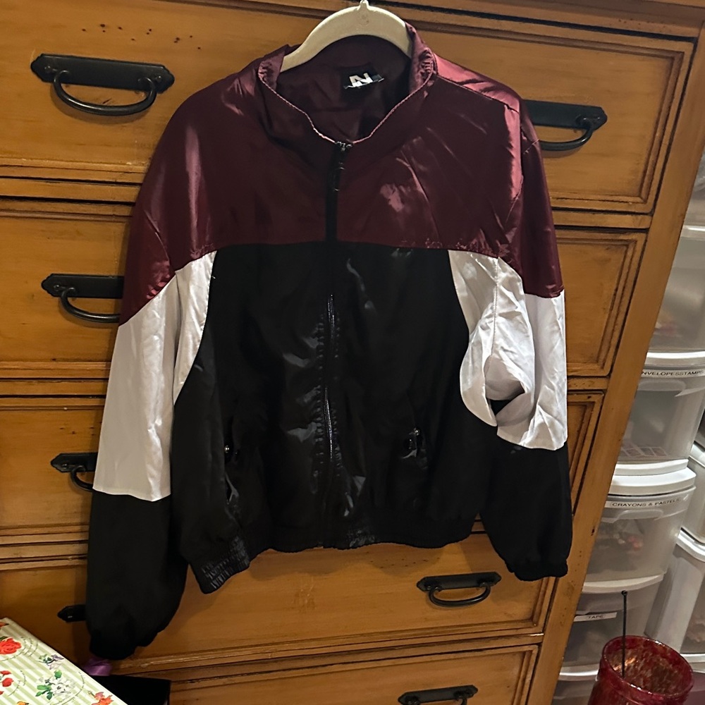 Unisex windbreaker 
New Look Burgundy and Black Jacket